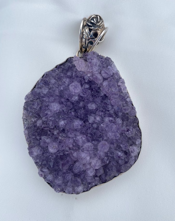 sterling silver and raw amethyst crystal pendant